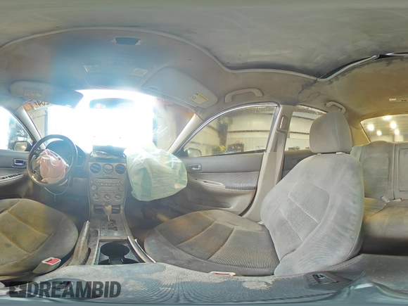 2004 Mazda 6 i with VIN 1YVFP80CX45N43521, listed as a Copart auction lot 73315234 with 182,697 mi miles and Salvage Title. Bid and sale history available at DreamBid. Image 13.