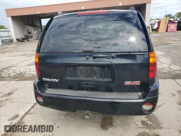 2003 GMC Envoy SLE z VIN 1GKDT13S432160651, wystawiony jako Copart lot #56938205 z przebiegiem 197 593 mil mil oraz Szkoda całkowita • Salvage title. Historia ofert i sprzedaży dostępna na DreamBid. Obrazek 6.