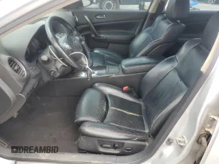 2012 Nissan Maxima SV с VIN 1N4AA5AP8CC864734, выставлен на аукционе Copart как лот 58805175 с пробегом 165 192 миль миль и Списание • Salvage title. История ставок и продаж доступна на DreamBid. Изображение 7.