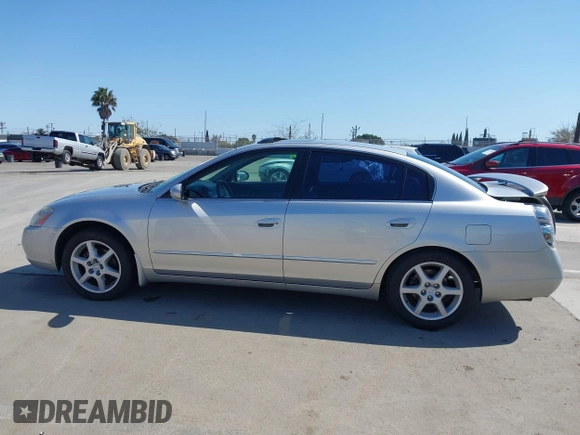 2002 Nissan Altima SE with VIN 1N4BL11E72C169164, listed as a IAAI auction lot 41992002 with 100,211 mi miles. Bid and sale history available at carsss.com. Image 14.