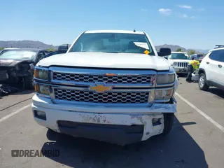 2014 Chevrolet Silverado 1500 LT with VIN 1GCRCREH0EZ355674, listed as a IAAI auction lot 42180931 with 195,496 mi miles and . Bid and sale history available at DreamBid. Image 12.