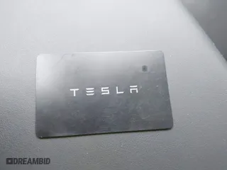 2024 Tesla Model 3 Long Range with VIN 5YJ3E1EB0RF812296, listed as a IAAI auction lot 41799217 with 6,990 mi miles. Bid and sale history available at carsss.com. Image 11.