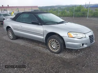2005 Chrysler Sebring Touring z VIN 1C3EL55R25N603578, wystawiony jako IAAI lot #42535063 z przebiegiem 155 214 mil mil oraz . Historia ofert i sprzedaży dostępna na DreamBid. Obrazek 1.