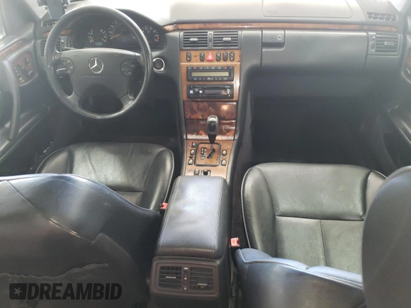 2002 Mercedes-Benz E-Class with VIN WDBJF65J12B499887, listed as a Copart auction lot 48708375 with 194,556 mi miles and Salvage Title. Bid and sale history available at carsss.com. Image 8.