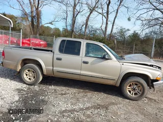 2003 Dodge Dakota SLT with VIN 1D7HL48X53S348636, listed as a IAAI auction lot 41329221 with 133,075 mi miles. Bid and sale history available at carsss.com. Image 13.