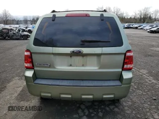 2008 Ford Escape XLS с VIN 1FMCU02Z58KE30129, выставлен на аукционе Copart как лот 48611765 с пробегом 97 014 миль миль и Списание • Salvage title. История ставок и продаж доступна на DreamBid. Изображение 6.