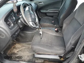 2013 Dodge Charger Police with VIN 2C3CDXAT7DH592408, listed as a Copart auction lot 54678835 with 180,084 mi miles and Salvage Title. Bid and sale history available at DreamBid. Image 7.