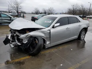 2012 Chrysler 300 with VIN 2C3CCAET5CH288759, listed as a Copart auction lot 83869294 with 100,575 mi miles and Salvage Title. Bid and sale history available at carsss.com. Image 1.