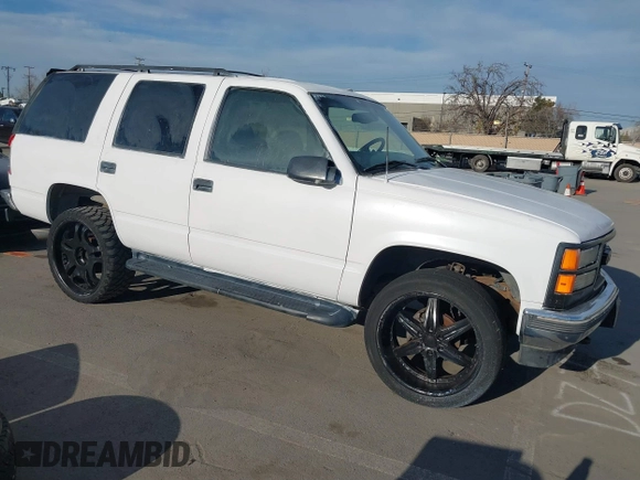 1997 GMC Yukon with VIN 1GKEK13R9VJ741768, listed as a IAAI auction lot 41692027 with 200,681 mi miles. Bid and sale history available at carsss.com. Image 1.