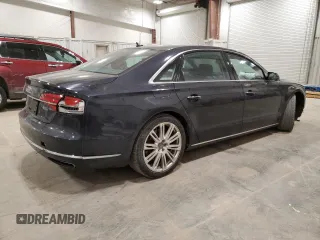 2015 Audi A8 3.0T z VIN WAU3GAFD3FN005842, wystawiony jako Copart lot #44649445 z przebiegiem 181 952 mil mil oraz Czysty tytuł • Clean title. Historia ofert i sprzedaży dostępna na DreamBid. Obrazek 3.