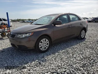 2013 Kia Forte EX with VIN KNAFU4A21D5719009, listed as a Copart auction lot 51609025 with 211,778 mi miles and Salvage Title. Bid and sale history available at carsss.com. Image 1.
