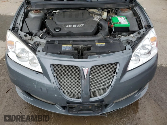 2009 Pontiac G6 GXP 1SA with VIN 1G2ZM577294217264, listed as a Copart auction lot 63824735 with 165,948 mi miles and Salvage title. Bid and sale history available at DreamBid. Image 11.