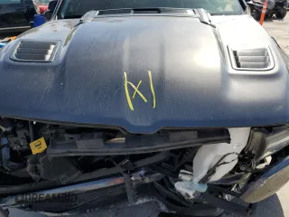 2021 Ram 1500 Laramie with VIN 1C6SRFJT3MN677537, listed as a Copart auction lot 57936295 with Not provided miles and Salvage title. Bid and sale history available at DreamBid. Image 11.