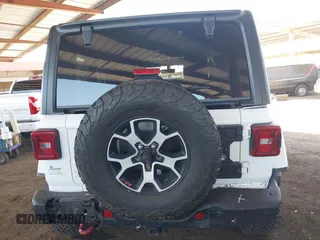 2020 Jeep Wrangler Unlimited Rubicon with VIN 1C4HJXFGXLW107958, listed as a IAAI auction lot 42058477 with 69,951 mi miles and . Bid and sale history available at DreamBid. Image 16.