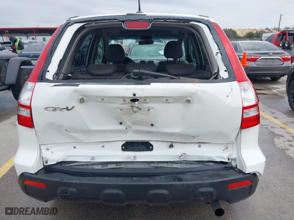 2009 Honda CR-V EX-L with VIN JHLRE38769C007979, listed as a IAAI auction lot 41582690 with 193,292 mi miles. Bid and sale history available at carsss.com. Image 16.