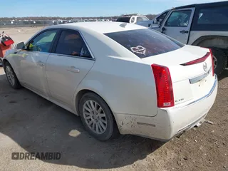 2011 Cadillac CTS Luxury with VIN 1G6DE5EY8B0128460, listed as a IAAI auction lot 41652189 with 294,211 mi miles and . Bid and sale history available at DreamBid. Image 3.