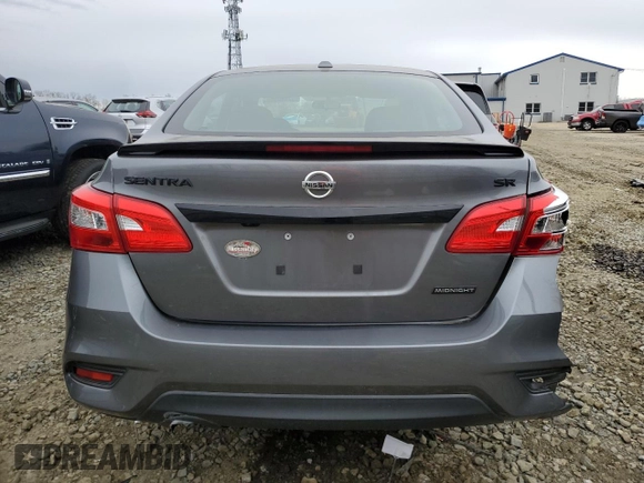 2018 Nissan Sentra S with VIN 3N1AB7AP4JY282981, listed as a Copart auction lot 52480955 with 57,217 mi miles and Salvage Title. Bid and sale history available at DreamBid. Image 6.