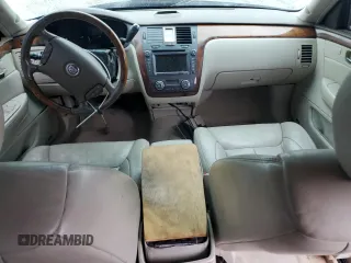 2006 Cadillac DTS 1SD z VIN 1G6KD57YX6U193025, wystawiony jako Copart lot #45784605 z przebiegiem Nie podano mil oraz Szkody całkowita. Historia ofert i sprzedaży dostępna na DreamBid. Obrazek 8.