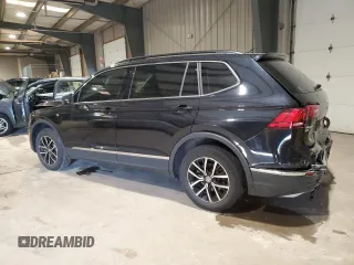 2021 Volkswagen Tiguan SE with VIN 3VV2B7AXXMM071024, listed as a Copart auction lot 52243675 with 31,448 mi miles and Salvage Title. Bid and sale history available at DreamBid. Image 2.