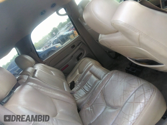 2004 Chevrolet Tahoe LT with VIN 1GNEC13ZX4R203631, listed as a IAAI auction lot 42797033 with Not provided miles and . Bid and sale history available at DreamBid. Image 8.