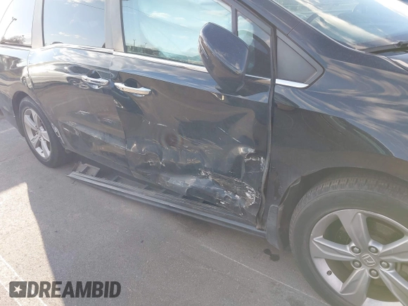 2019 Honda Odyssey EX-L with VIN 5FNRL6H74KB061567, listed as a IAAI auction lot 41810919 with 129,146 mi miles. Bid and sale history available at carsss.com. Image 6.