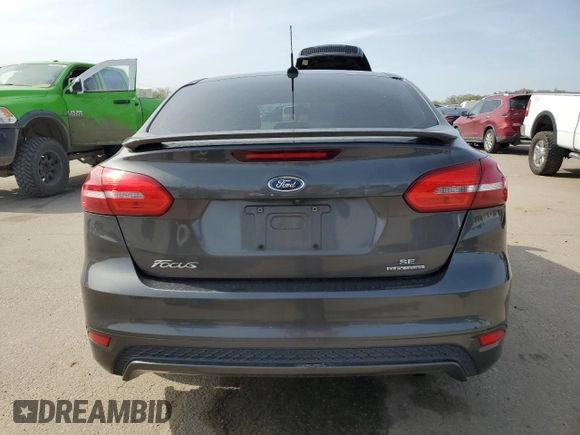 2015 Ford Focus SE with VIN 1FADP3F2XFL287593, listed as a Copart auction lot 51927795 with 110,911 mi miles and Salvage Title. Bid and sale history available at carsss.com. Image 6.