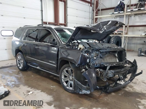 2016 GMC Yukon Denali with VIN 1GKS2CKJ8GR215954, listed as a IAAI auction lot 41362739 with 143,982 mi miles. Bid and sale history available at carsss.com. Image 1.