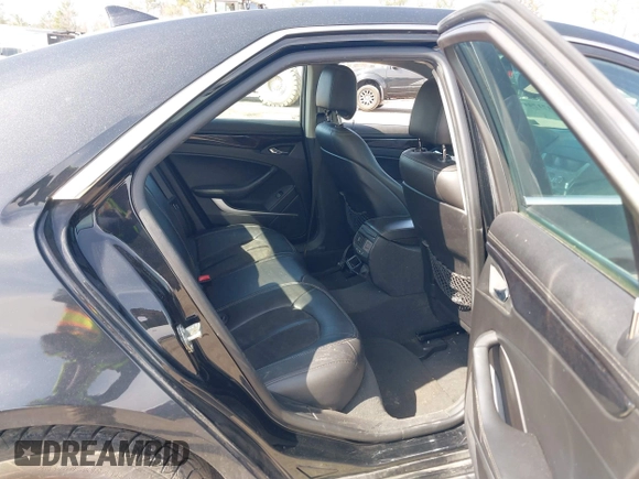 2012 Cadillac CTS Luxury with VIN 1G6DE5E56C0151579, listed as a IAAI auction lot 41717449 with 116,938 mi miles and . Bid and sale history available at DreamBid. Image 8.