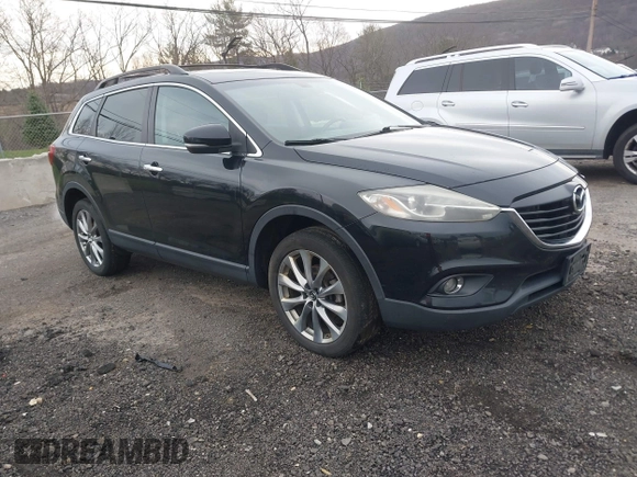 2015 Mazda CX-9 Grand Touring z VIN JM3TB3DV6F0464926, wystawiony jako IAAI lot #42035670 z przebiegiem 168 257 mil mil oraz . Historia ofert i sprzedaży dostępna na DreamBid. Obrazek 1.