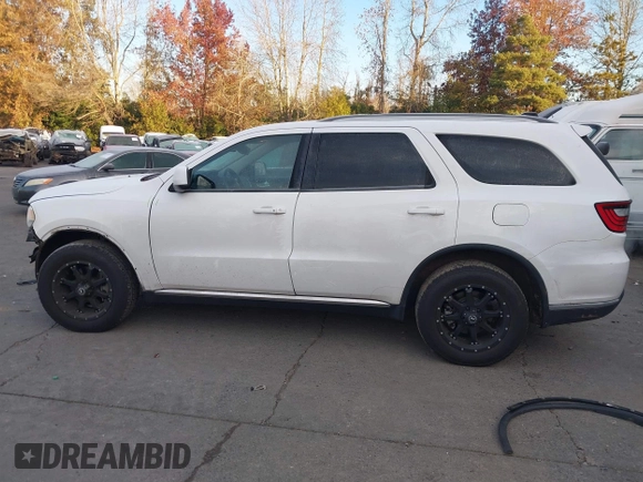 2015 Dodge Durango SXT with VIN 1C4RDJAG1FC745974, listed as a IAAI auction lot 41392820 with 124,861 mi miles and . Bid and sale history available at DreamBid. Image 15.