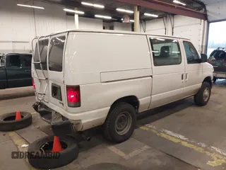 2011 Ford Econoline Cargo Commercial with VIN 1FTNE1EW5BDB01167, listed as a IAAI auction lot 41226859 with 248,606 mi miles and . Bid and sale history available at DreamBid. Image 4.