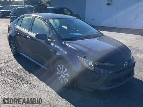 2021 Toyota Corolla Hybrid LE with VIN JTDEAMDE0MJ009233, listed as a Copart auction lot 50191765 with 212,244 mi miles and Clean Title. Bid and sale history available at carsss.com. Image 1.