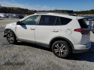 2016 Toyota RAV4 LE with VIN JTMZFREV2GJ077312, listed as a Copart auction lot 88358125 with 126,428 mi miles and Salvage Title. Bid and sale history available at carsss.com. Image 2.