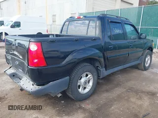 2003 Ford Explorer Sport Trac XLS z VIN 1FMZU77EX3UB99153, wystawiony jako IAAI lot #42029196 z przebiegiem Nie podano mil oraz . Historia ofert i sprzedaży dostępna na DreamBid. Obrazek 4.