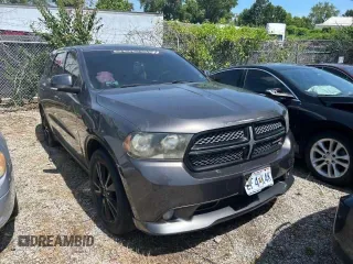 2013 Dodge Durango R/T z VIN 1C4SDHCT0DC689270, wystawiony jako Copart lot #66862535 z przebiegiem 169 510 mil mil oraz Czysty tytuł • Clean title. Historia ofert i sprzedaży dostępna na DreamBid. Obrazek 1.