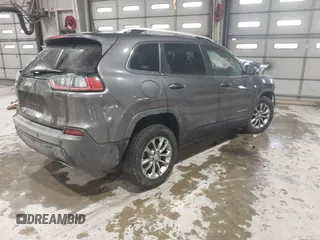 2020 Jeep Cherokee Latitude Plus with VIN 1C4PJMLX5LD642190, listed as a IAAI auction lot 41502512 with 1,600,800 mi miles. Bid and sale history available at carsss.com. Image 4.