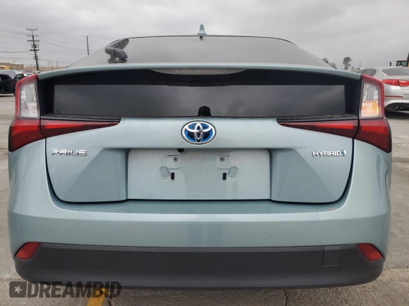 2021 Toyota Prius L Eco with VIN JTDKAMFU4M3136370, listed as a Copart auction lot 53513905 with 63,165 mi miles and Salvage title. Bid and sale history available at DreamBid. Image 6.