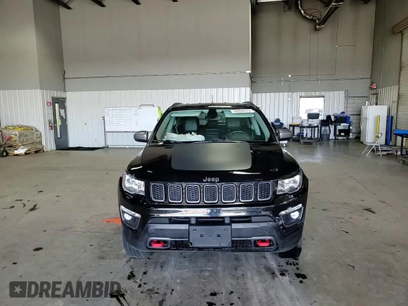 2019 Jeep Compass Trailhawk with VIN 3C4NJDDB4KT647187, listed as a Copart auction lot 50260575 with 63,098 mi miles and Salvage Title. Bid and sale history available at carsss.com. Image 12.