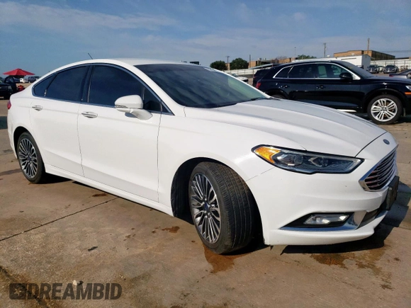 2017 Ford Fusion Titanium с VIN 3FA6P0K99HR118082, выставлен на аукционе Copart как лот 55459615 с пробегом 89 148 миль миль и Чистый • Clean title. История ставок и продаж доступна на DreamBid. Изображение 4.