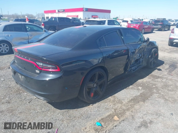 2020 Dodge Charger SXT with VIN 2C3CDXBG2LH229627, listed as a IAAI auction lot 41596342 with 124,012 mi miles and . Bid and sale history available at DreamBid. Image 4.