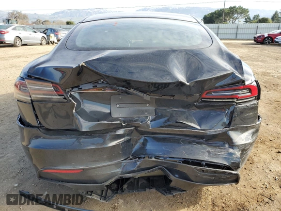 2023 Tesla Model S with VIN 5YJSA1E57PF507456, listed as a Copart auction lot 44649945 with 8,760 mi miles and Salvage title. Bid and sale history available at DreamBid. Image 6.