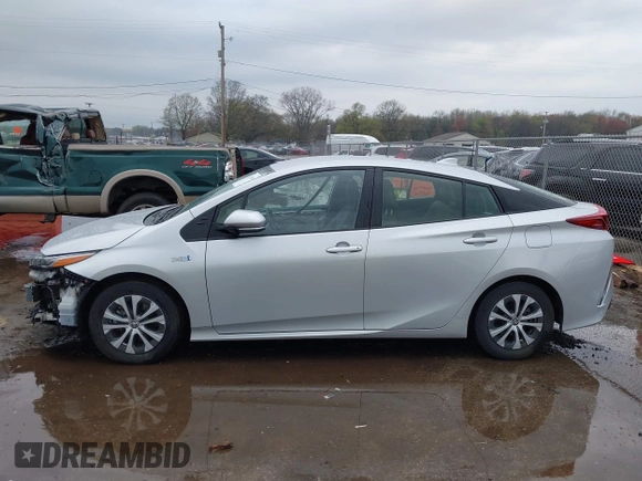2021 Toyota Prius LE with VIN JTDKAMFP9M3170928, listed as a IAAI auction lot 42123934 with 58,293 mi miles and . Bid and sale history available at DreamBid. Image 15.