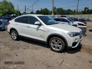 2015 BMW X4 xDrive28i with VIN 5UXXW3C56F0M87279, listed as a Copart auction lot 60426535 with 130,272 mi miles and Clean title. Bid and sale history available at DreamBid. Image 4.
