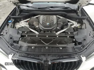 2020 BMW X5 M50i with VIN 5UXJU4C02L9C46464, listed as a Copart auction lot 43455805 with 89,337 mi miles and Salvage Title. Bid and sale history available at DreamBid. Image 12.