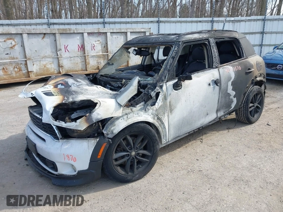 2014 MINI Countryman S with VIN WMWZC3C55EWT00416, listed as a IAAI auction lot 42031870 with Not Provided miles and . Bid and sale history available at DreamBid. Image 2.