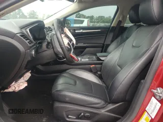 2019 Ford Fusion Titanium z VIN 3FA6P0D99KR221328, wystawiony jako Copart lot #57104515 z przebiegiem 138 427 mil mil oraz Szkoda całkowita • Salvage title. Historia ofert i sprzedaży dostępna na DreamBid. Obrazek 7.