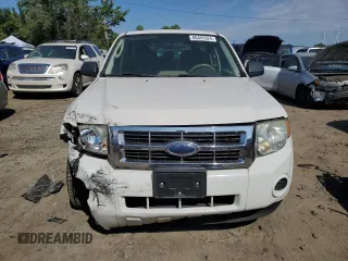 2009 Ford Escape XLS z VIN 1FMCU02779KB08396, wystawiony jako Copart lot #80984104 z przebiegiem 194 743 mil mil oraz Szkoda całkowita • Salvage title. Historia ofert i sprzedaży dostępna na DreamBid. Obrazek 5.