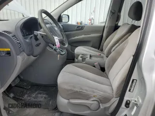 2012 Kia Sedona LX with VIN KNDMG4C79C6496785, listed as a Copart auction lot 73310344 with 130,243 mi miles and Salvage Title. Bid and sale history available at carsss.com. Image 7.