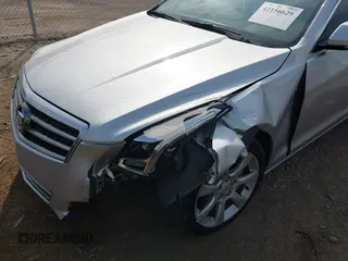 2014 Cadillac ATS Luxury RWD with VIN 1G6AB5RX7E0143954, listed as a IAAI auction lot 42156629 with 79,619 mi miles and . Bid and sale history available at DreamBid. Image 6.