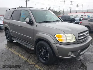2004 Toyota Sequoia Limited with VIN 5TDZT38AX4S228216, listed as a IAAI auction lot 41558237 with 214,534 mi miles. Bid and sale history available at carsss.com. Image 1.